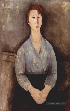  1919 - femme assise en blouse bleue 1919 Amedeo Modigliani